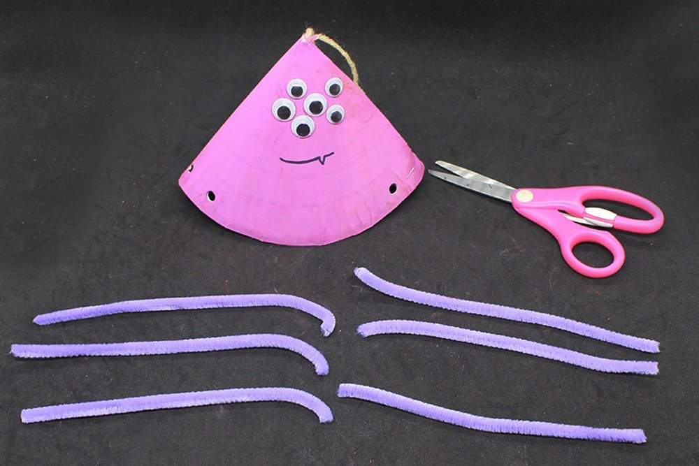 How to Make a Paper Plate Spider - Step 20