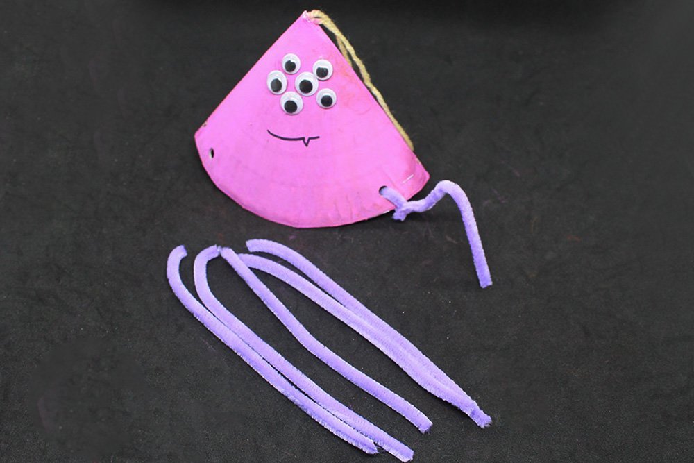 How to Make a Paper Plate Spider - Step 24