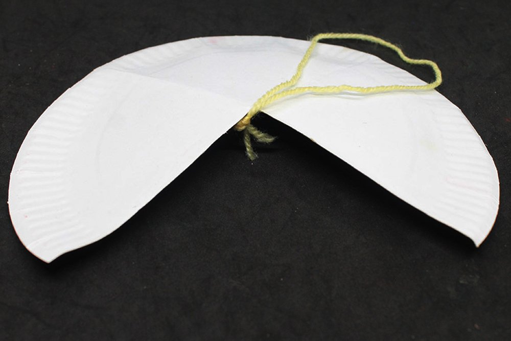 How to Make a Paper Plate Spider - Step 6