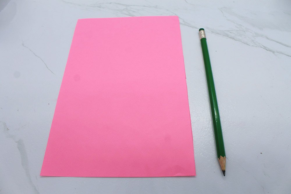 How to Make a Paper Plate Flamingo - Step 25
