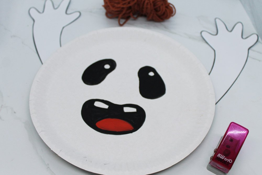 How to Make a Paper Plate Ghost - Step 14