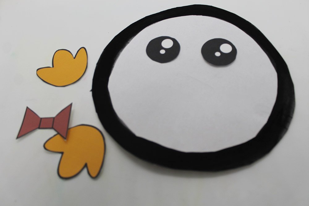 How to Make a Paper Plate Penguin - Step 10