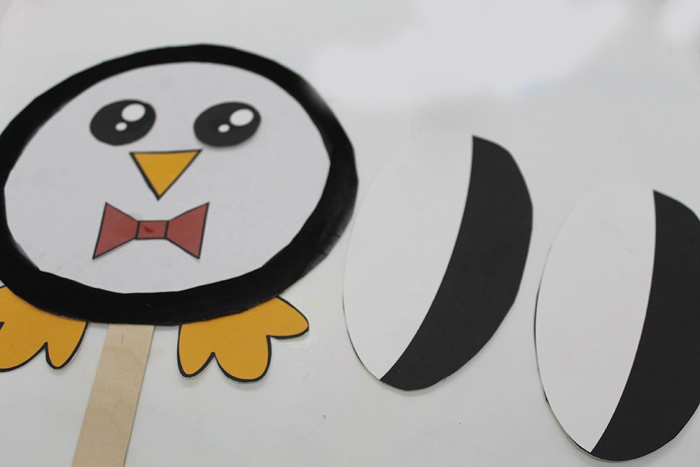 How to Make a Paper Plate Penguin - Step 17