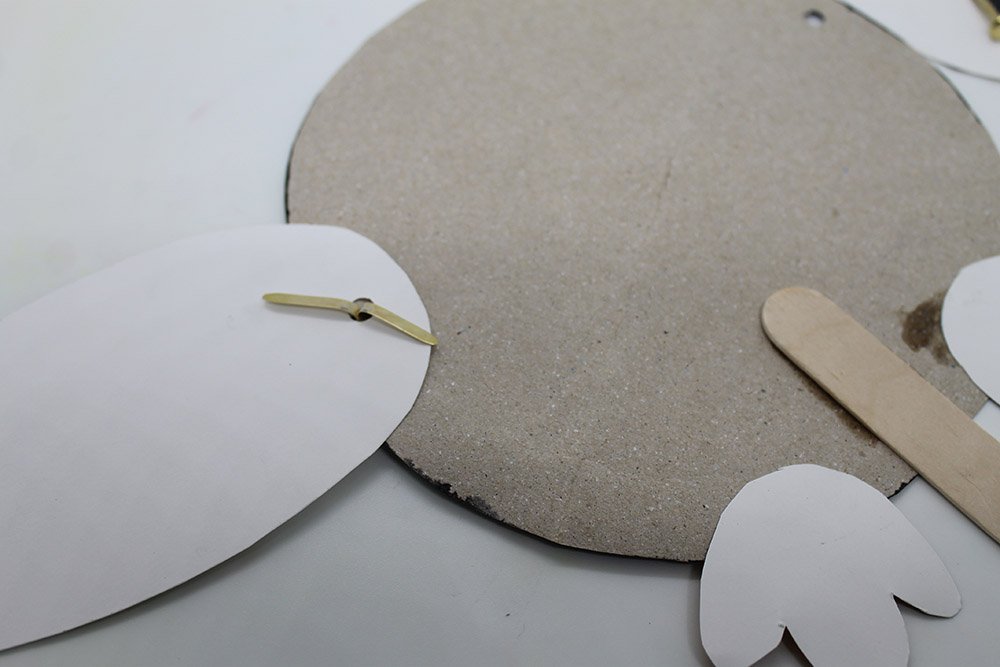 How to Make a Paper Plate Penguin - Step 24
