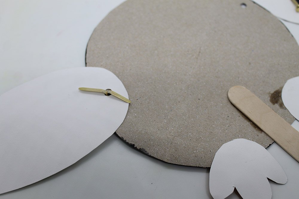 How to Make a Paper Plate Penguin - Step 24