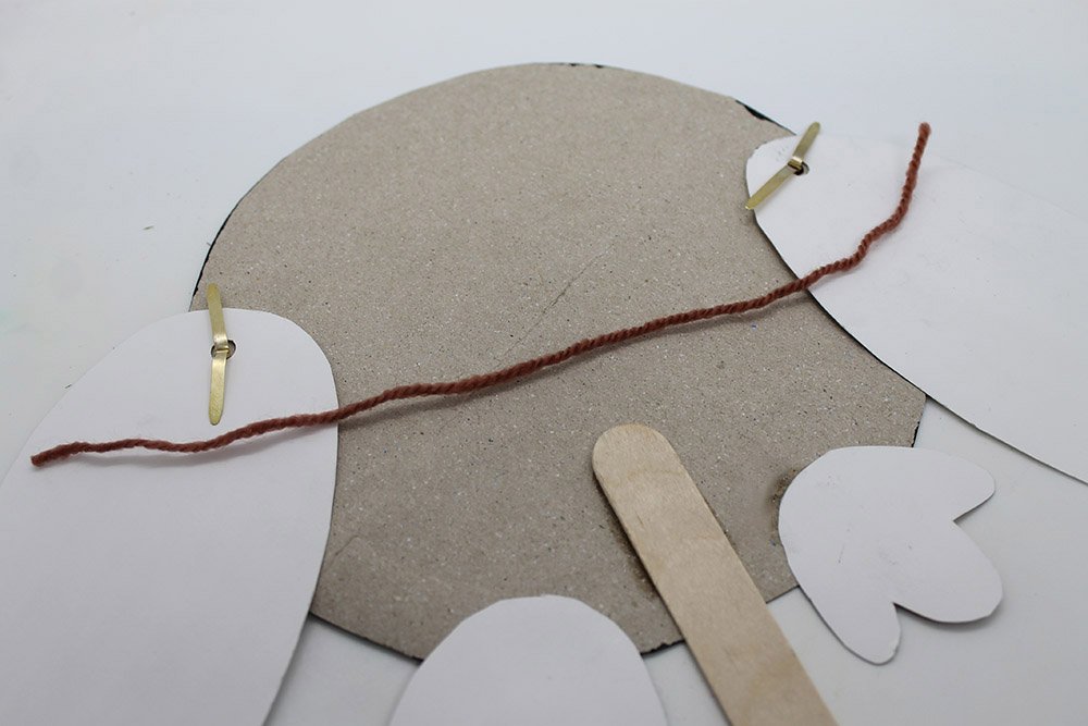 How to Make a Paper Plate Penguin - Step 27