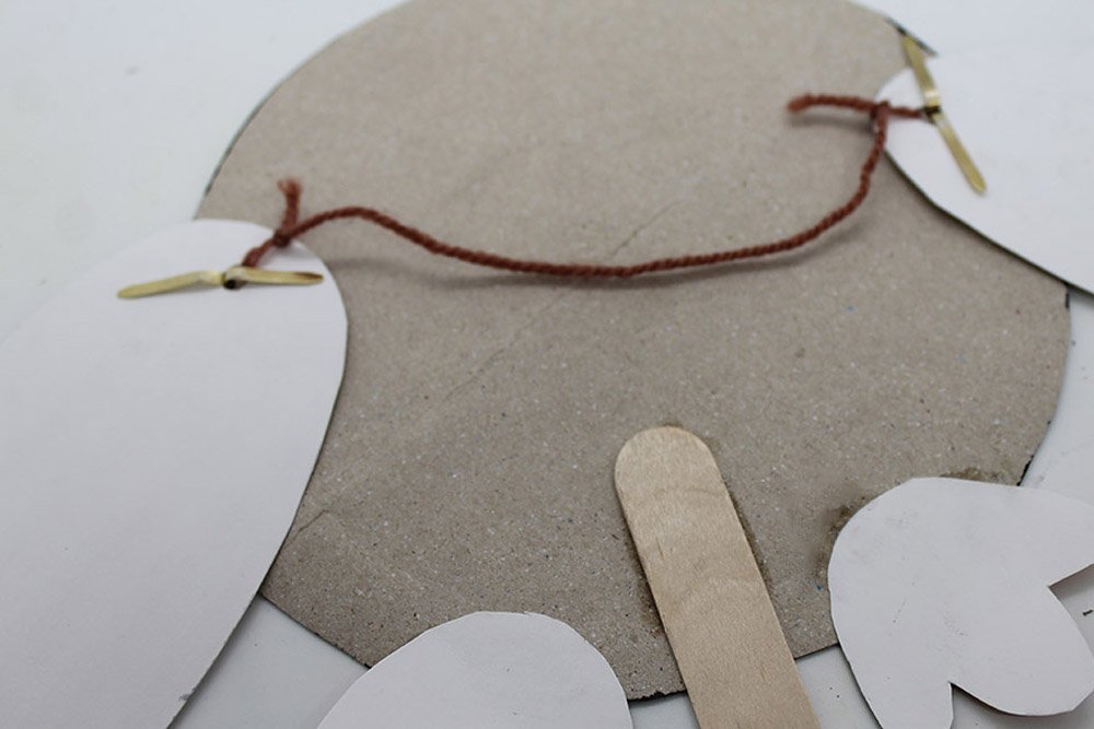 How to Make a Paper Plate Penguin - Step 30