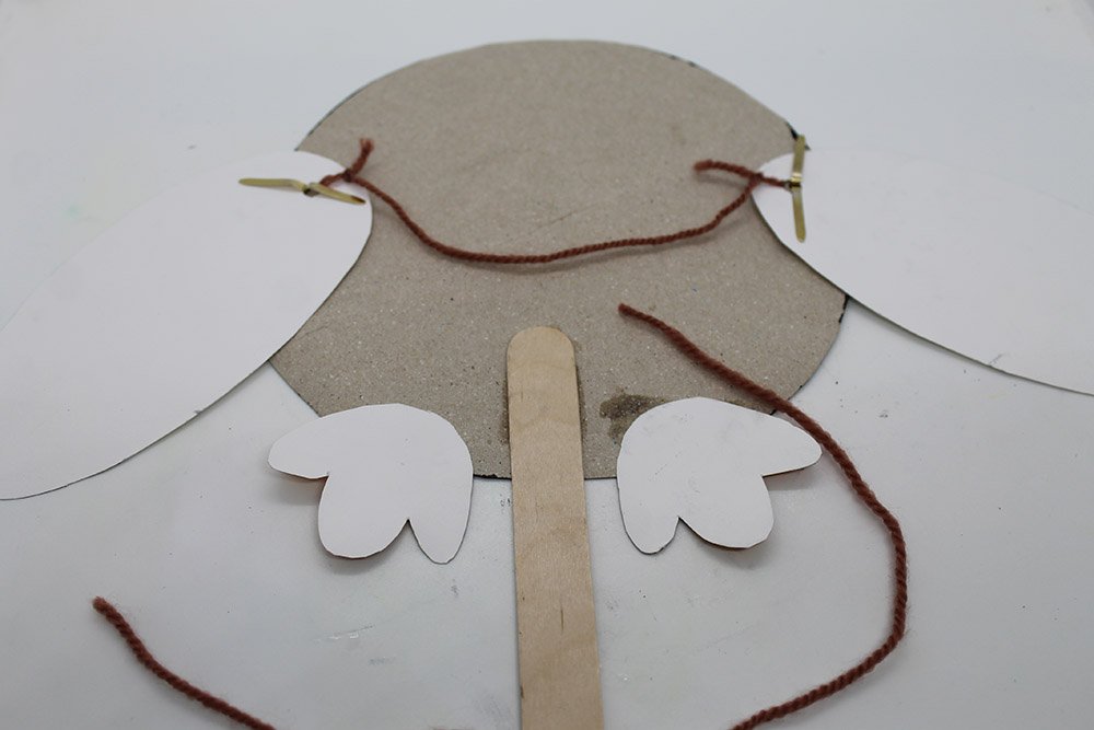 How to Make a Paper Plate Penguin - Step 31