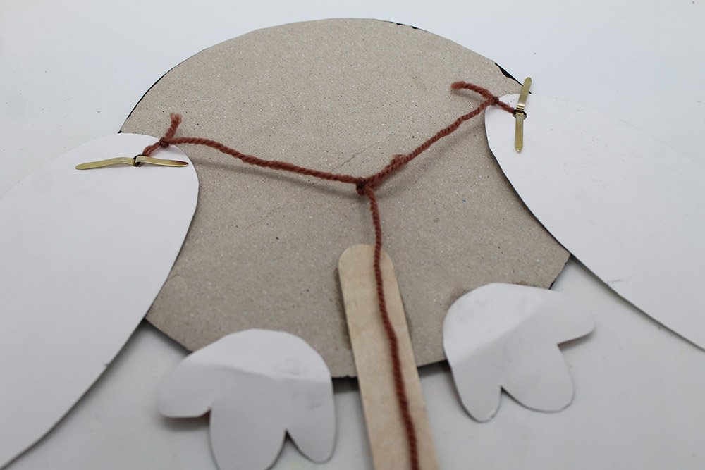 How to Make a Paper Plate Penguin - Step 32