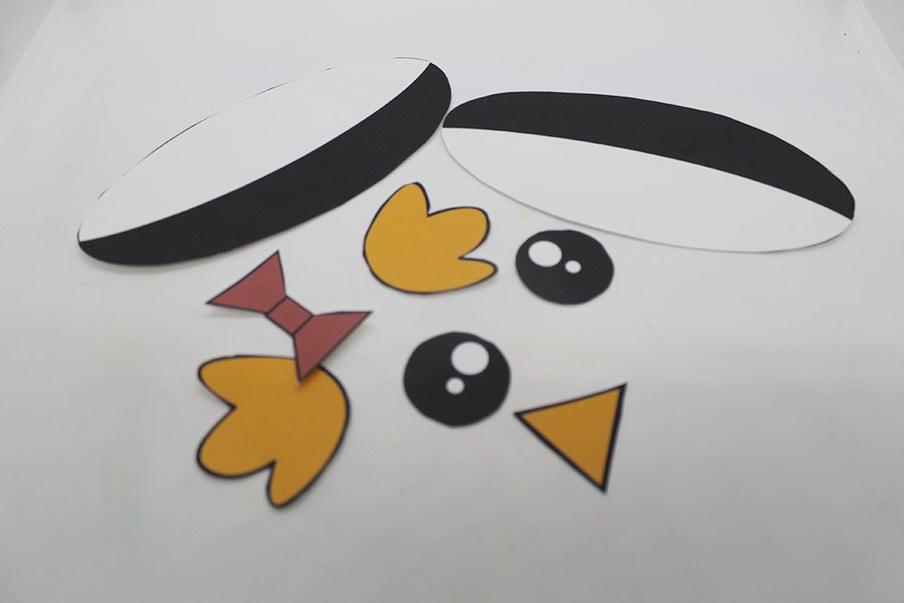 How to Make a Paper Plate Penguin - Step 8