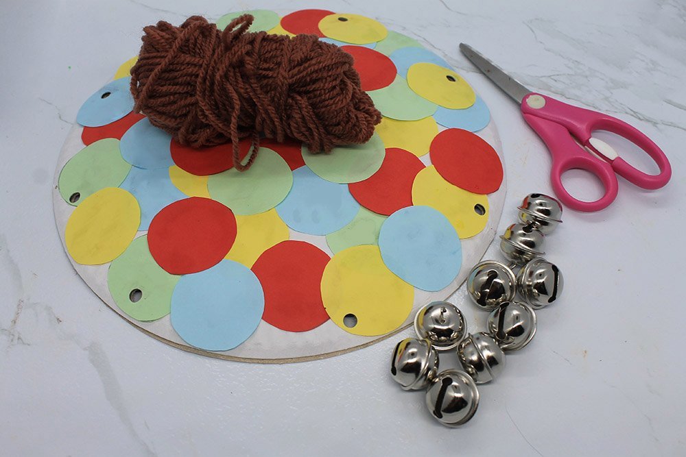 How to Make a Paper Plate Tambourine - Step 15
