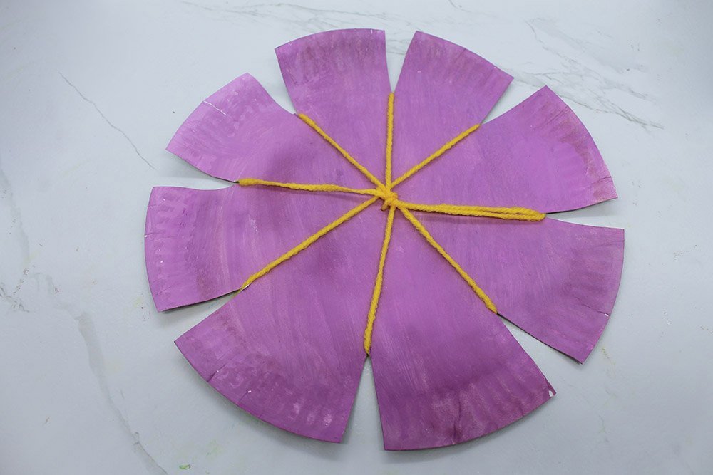 How to Make a Paper Plate Weave - Step 12