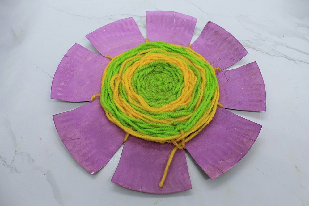 How to Make a Paper Plate Weave - Step 30