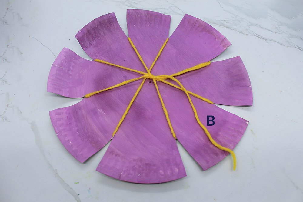 How to Make a Paper Plate Weave - Step 9
