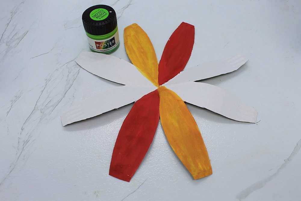 How To Make a Paper Plate Beach Ball - Step 12