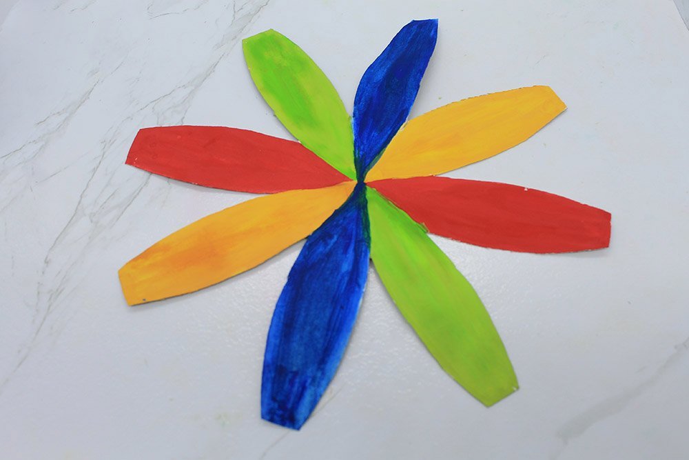 How To Make a Paper Plate Beach Ball - Step 14