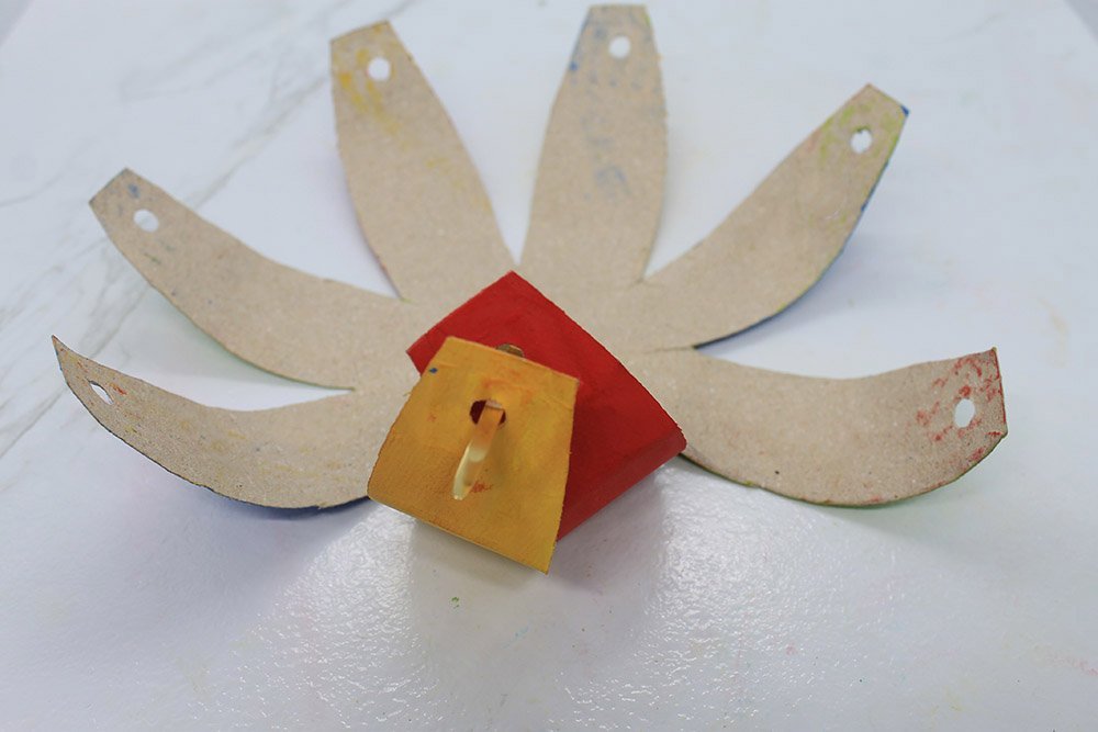 How To Make a Paper Plate Beach Ball - Step 19