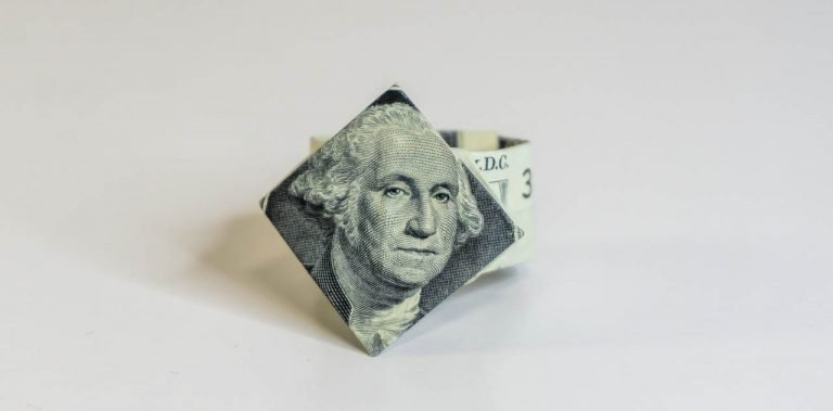 How to Fold a Dollar Bill into a Ring Instructions