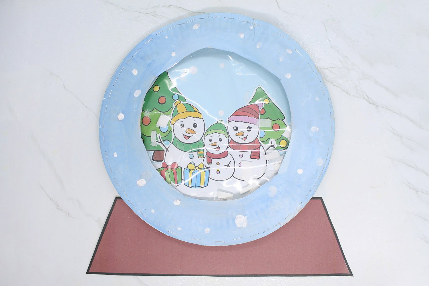 how_to_make_a_paper_plate_snow_globe_step_finished