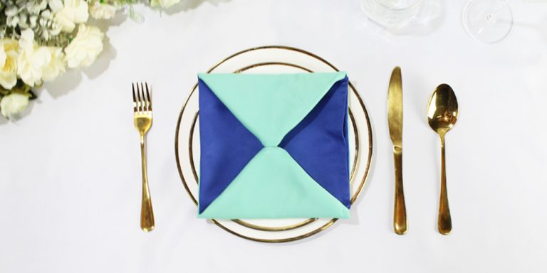 Discover How to Make an Hourglass Inspired Square Napkin Fold