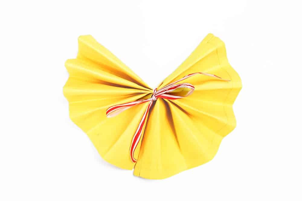 How to Make a Sunflower Napkin Fold - Step 07